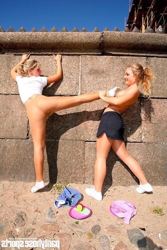 12P Two gymnasts in pantyhose working riverside
