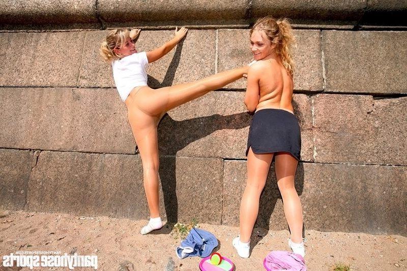12P Two gymnasts in pantyhose working riverside
