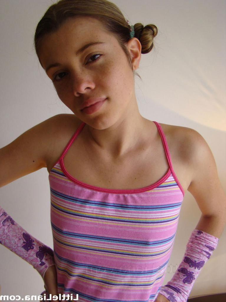 16P Adorable amateur teenie babe shows her hot pussy