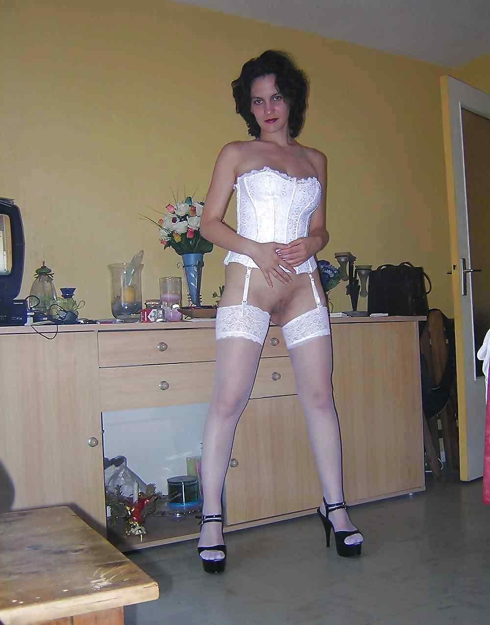 24P Amateur MILF Posing In Stockings And High Heels by DarKKo