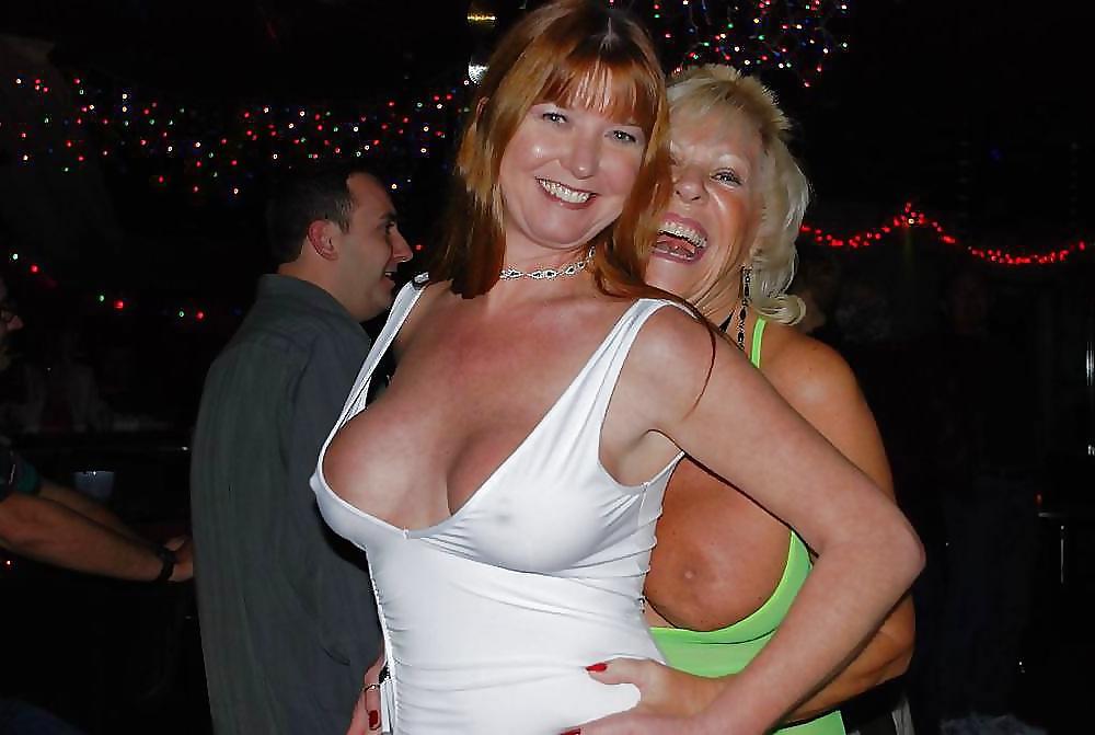 25P Amateur matures outside with their tits hanging out 4