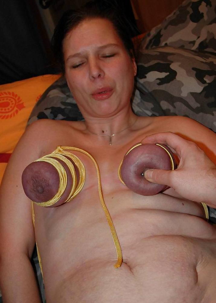 20P German amateur tits bondage