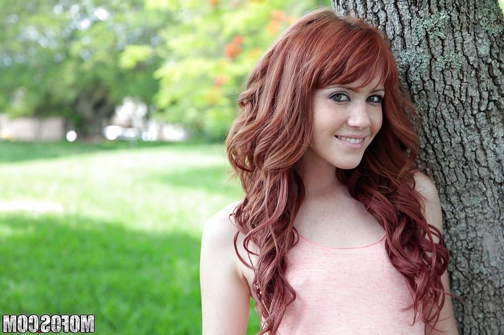 16P Redhead sweetie Elle Alexandra revealing her tiny curves outdoor