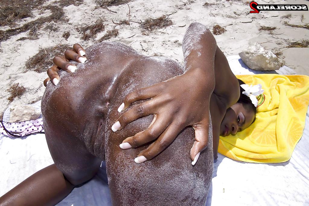 16P Black mom Nikki Jaye freeing huge juggs from bikini outdoors on beach