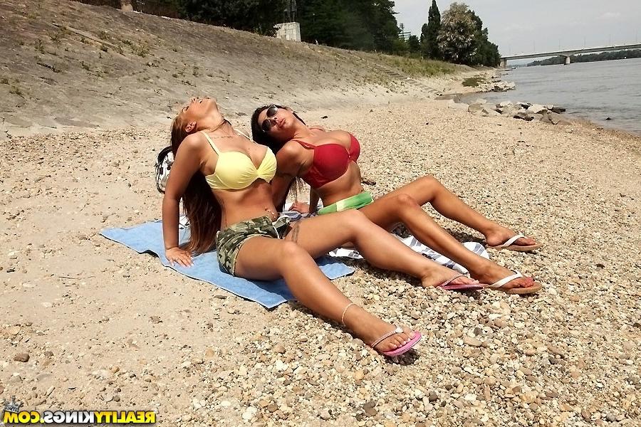16P Lesbian babes Kyra Hot and Candy Coxx are having amazing time outdoor