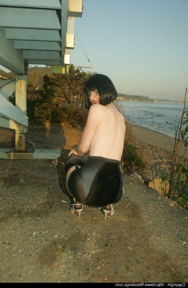 12P Stunning mature lady in black nylon stockings stripping outdoor