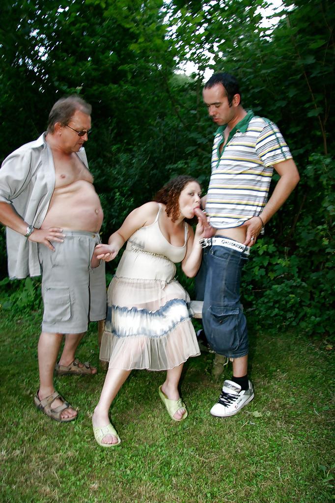 16P Curly-haired pregnant slut gets banged by four horny lads outdoor