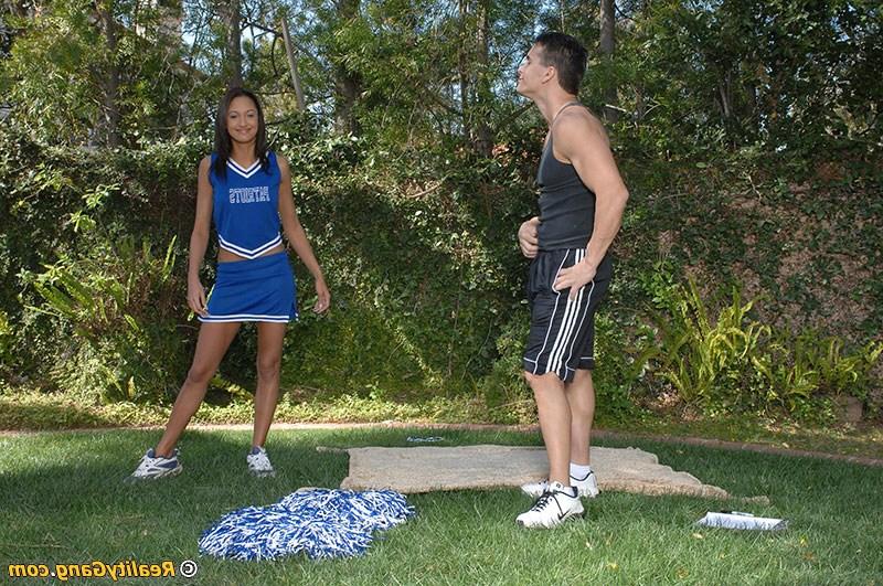 16P Amazingly sexy cheerleader with shaved slit Halia Hill gets nailed outdoor