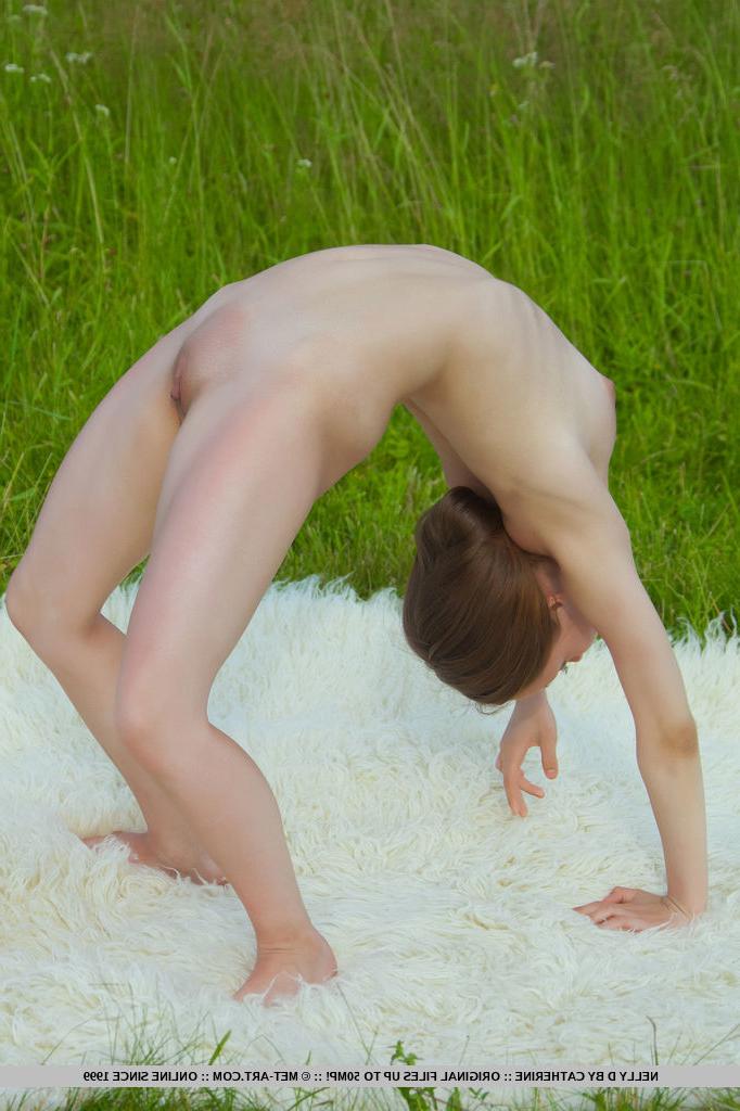 18P Flexible young Nelly D stretching to expose shaved pussy & teeny tits outdoors