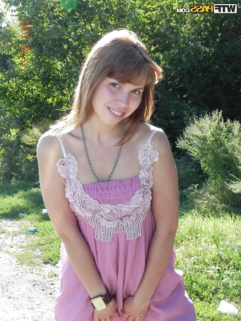 16P Brunette slut babe is undressing her titties and pussy outdoor