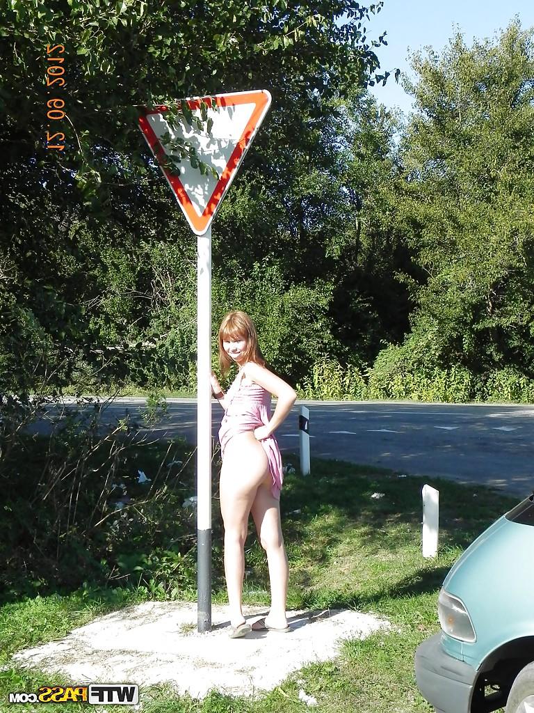 16P Brunette slut babe is undressing her titties and pussy outdoor
