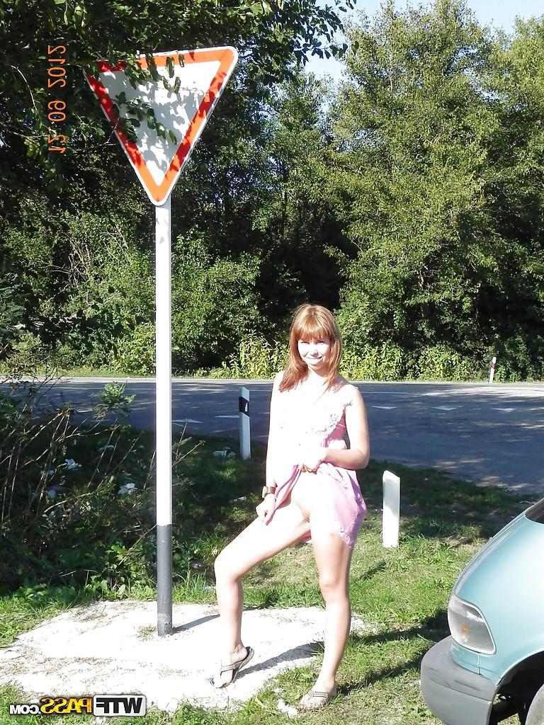 16P Brunette slut babe is undressing her titties and pussy outdoor