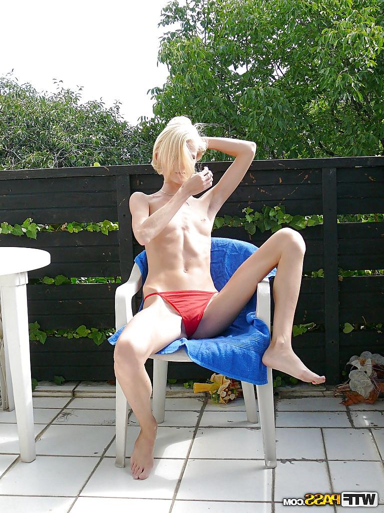 16P Slippy blonde amateur with long legs gets rid of her lingerie outdoor