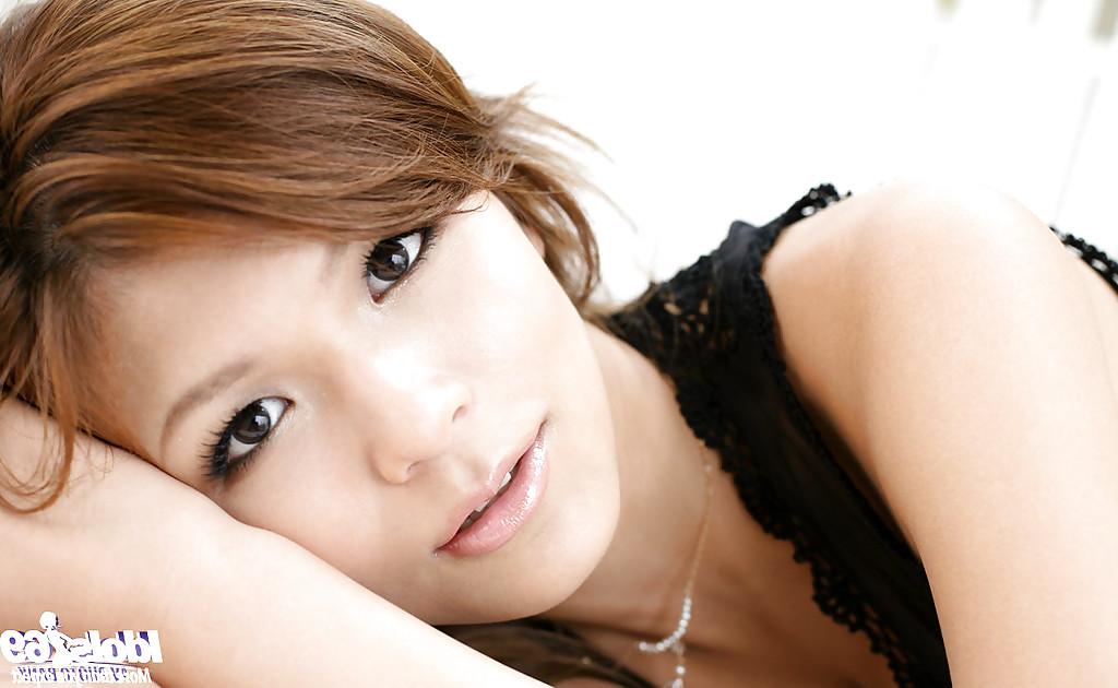 15P Alluring asian babe slipping off her lingerie and posing naked