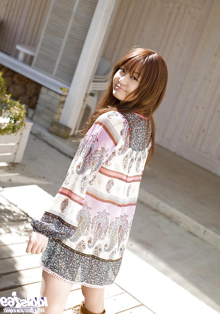 16P Alluring asian cutie in miniskirt uncovering her tempting curves