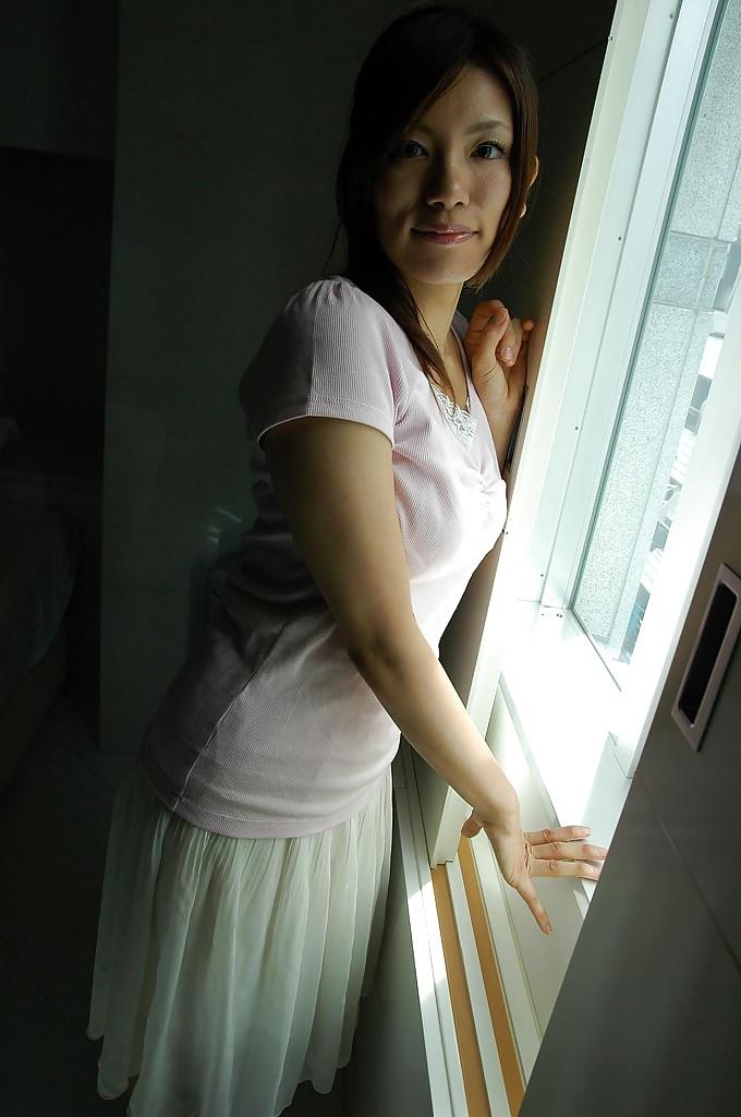 16P Alluring asian babe Rikako Yokoyama getting rid of her clothes
