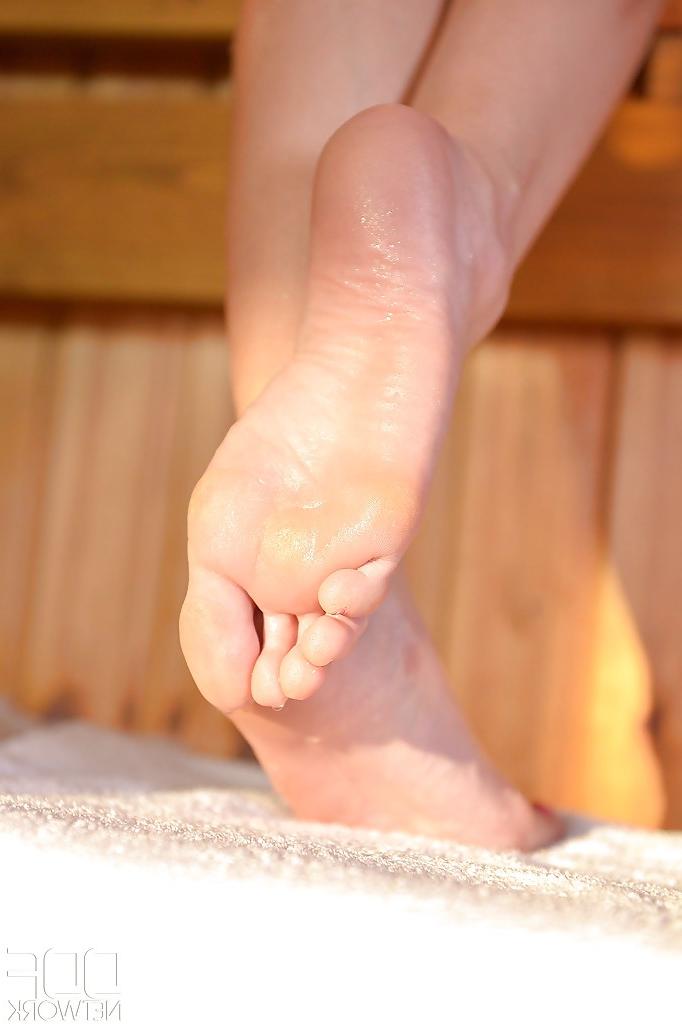 16P Seductive Euro hottie Mona Kim models her alluring legs and sexy feet