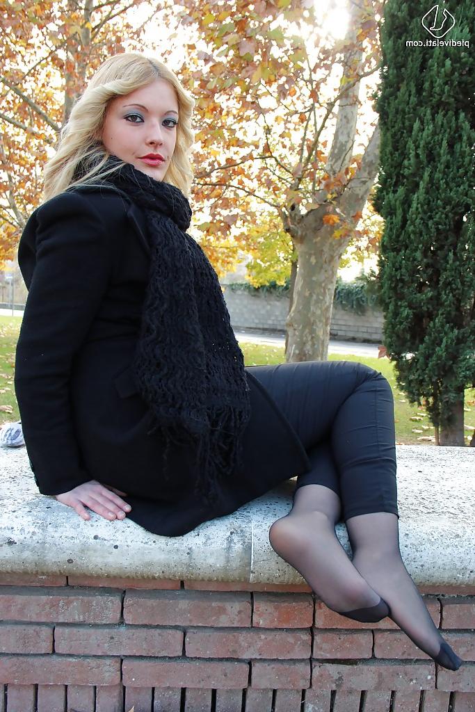 16P Smooth looking blonde babe Christelle in foot fetish mood outdoor