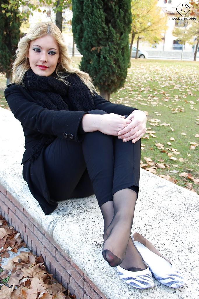 16P Smooth looking blonde babe Christelle in foot fetish mood outdoor