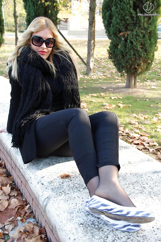 16P Smooth looking blonde babe Christelle in foot fetish mood outdoor