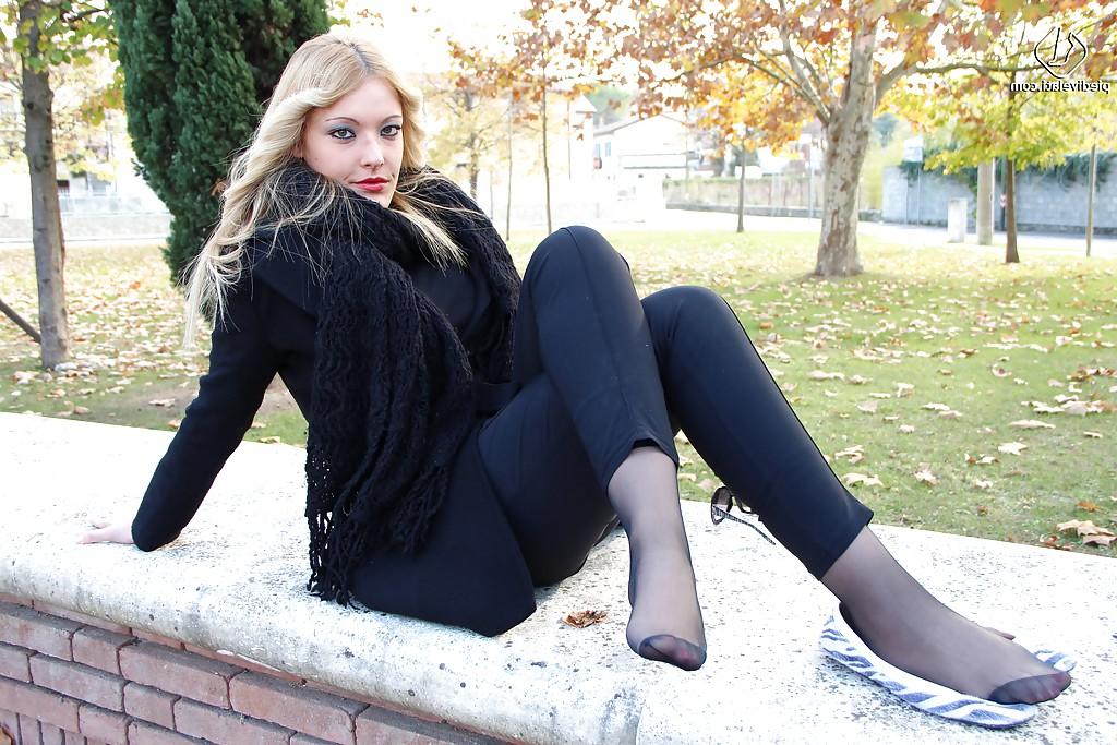 16P Smooth looking blonde babe Christelle in foot fetish mood outdoor