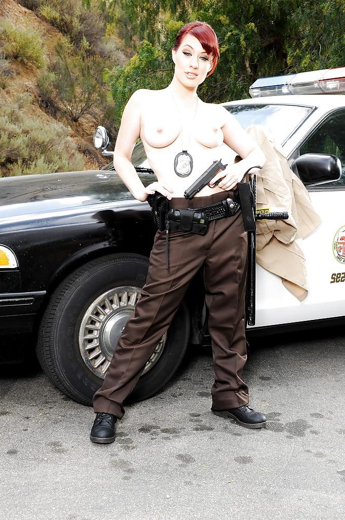 12P Redhead pornstar babe Jessica Ryan strips off police uniform outdoors