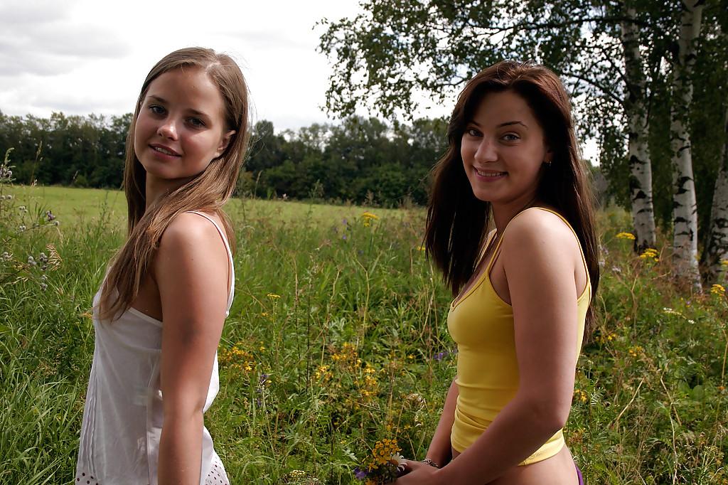 16P Seductive teen babes sshowcasing their petite curves for photos outdoor