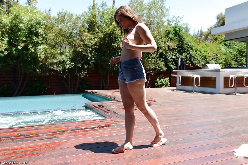 16P Leggy teen babe Kylie Quinn strips off shorts and bikini outdoors by pool