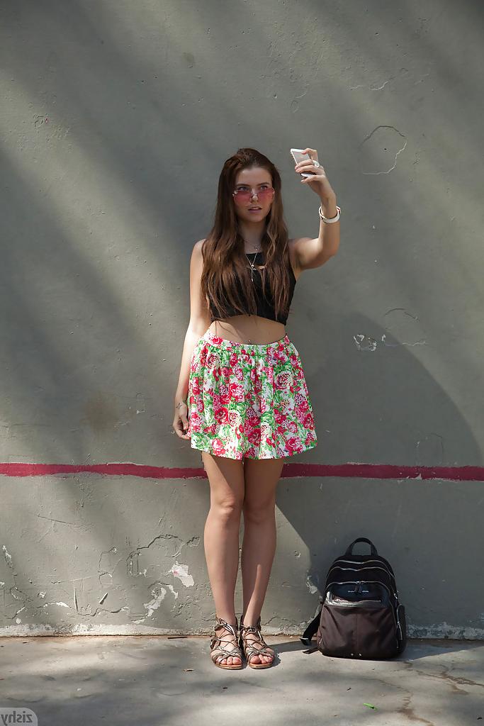 12P European hottie Marina Visconti heads outdoors to flash panties and breasts