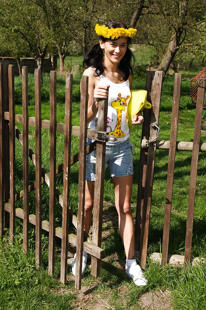 16P Sweet brunette teen Amanda undressing her clothes outdoors