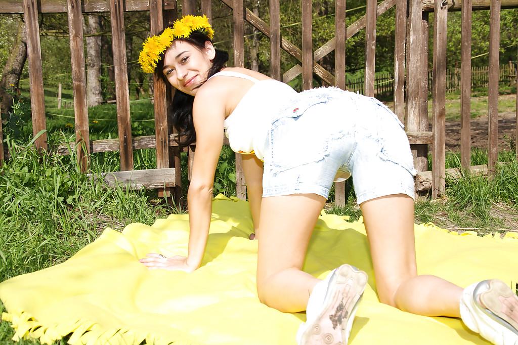 16P Sweet brunette teen Amanda undressing her clothes outdoors