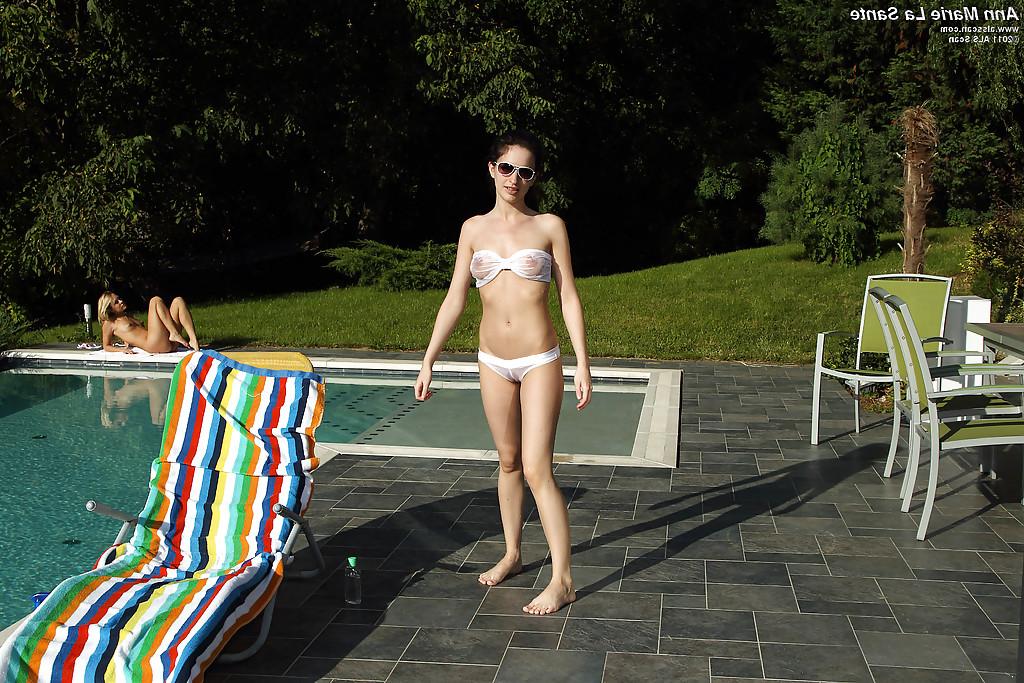 16P Slim teen in sunglasses taking off her bikini and teasing her slit outdoor