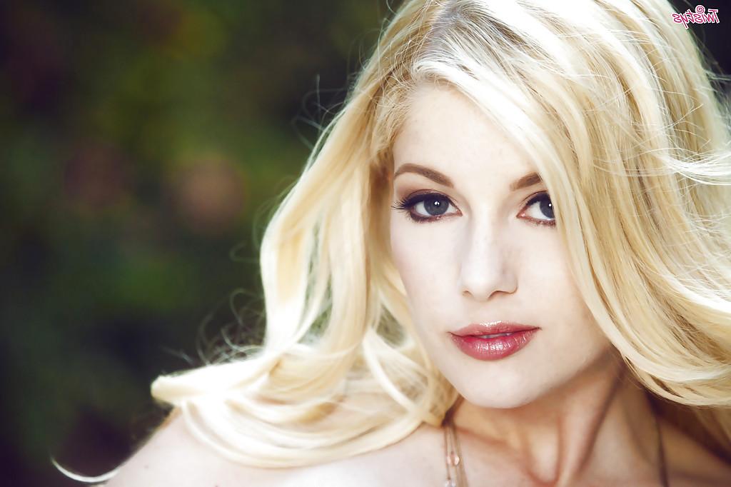 16P Close up posing scene featuring blonde pornstar Charlotte Stokely outdoor