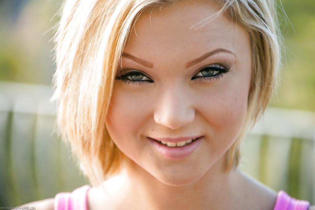 16P Outdoor posing session features teen babe Dakota Skye in panties