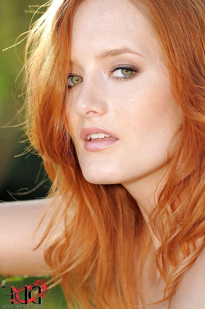 16P Foxy redhead euro babe with tempting fanny getting nude outdoor