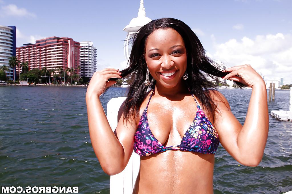16P Ebony babe in bikini Imani Rose showing off her titties and slit outdoor