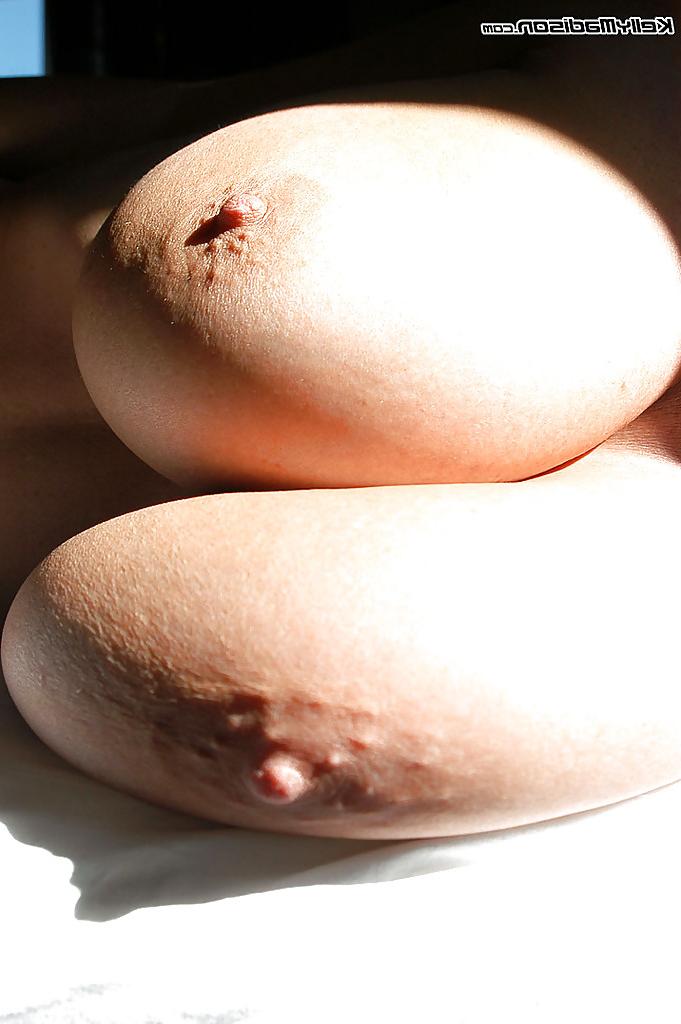 15P Big tits amateur milf Kelly Madison teases her nipples in close up