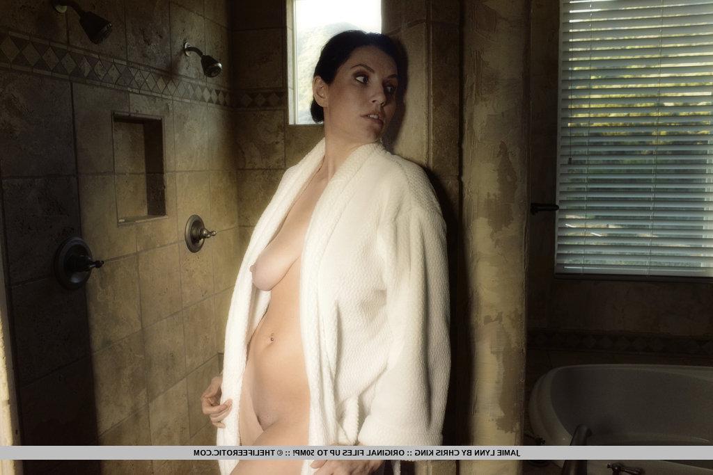 16P Jamie Lynn heads to the bathroom and takes a shower. With the cool water trickling down her sensitive body, she feels her libido rising and can't help touching herself.