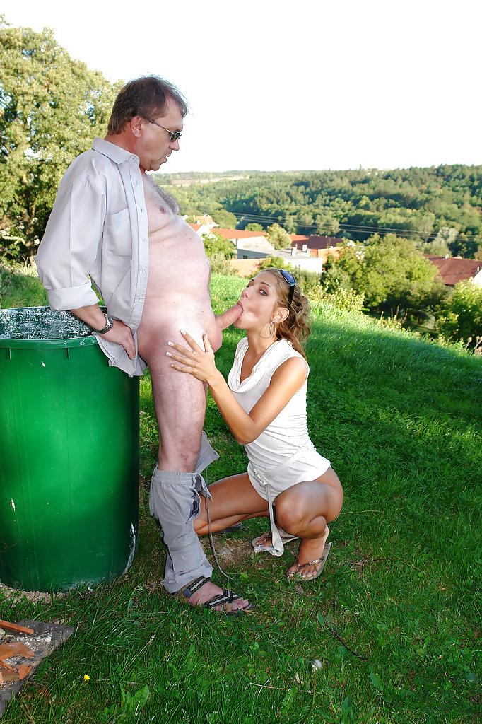 16P Outdoor cumshot scene with a marvelous girl doing blowjob to her man