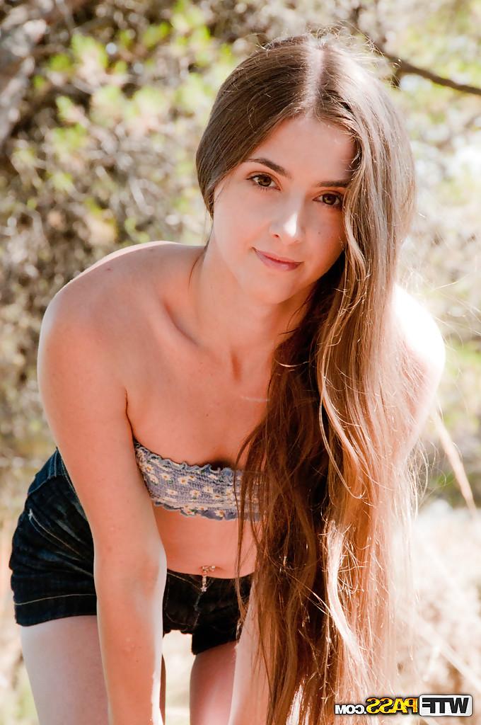 16P Alluring babe Leila demonstrating tiny tits and masturbating outdoors