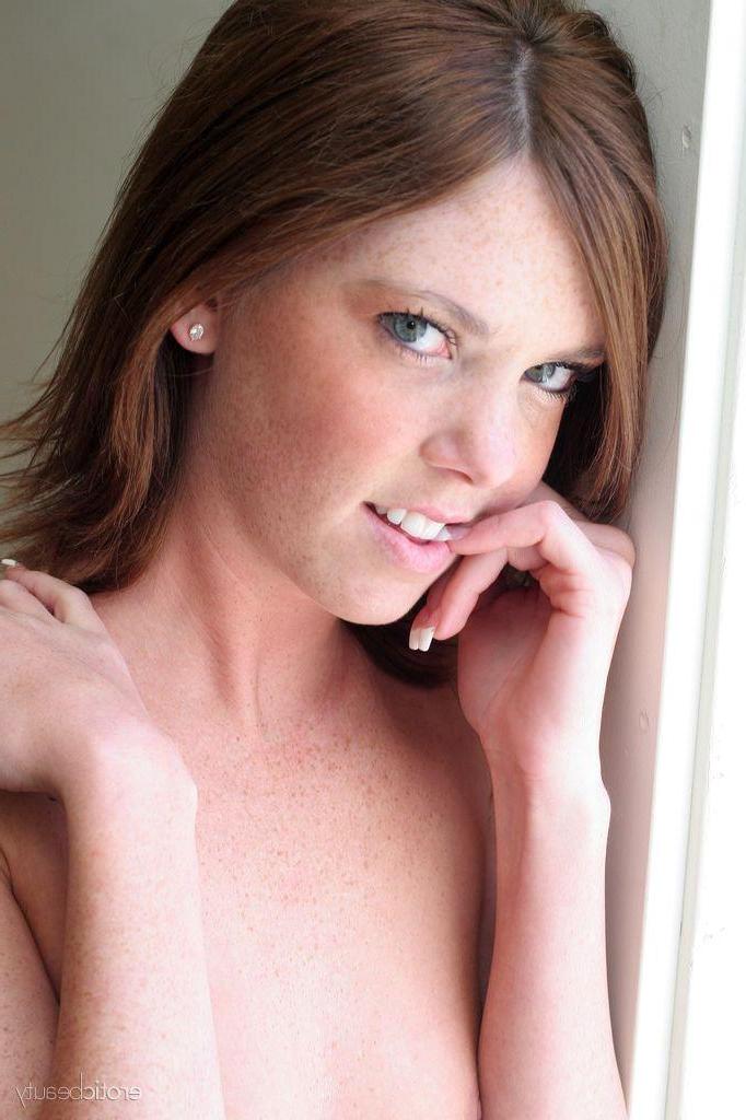 16P Justine surely looks sexy and alluring posing naked and uninhibited all over the sofa