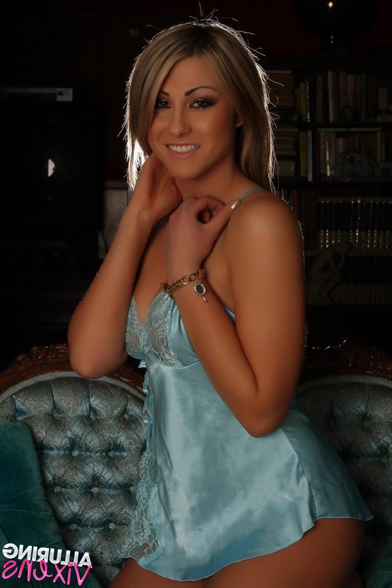 12P Stunning babe Melanie Ann teases in a skimpy low cut satin lingerie
