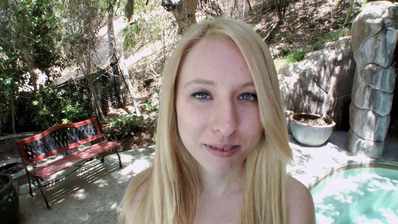 16P Blonde teen Sofie Carter gives a hand outdoors