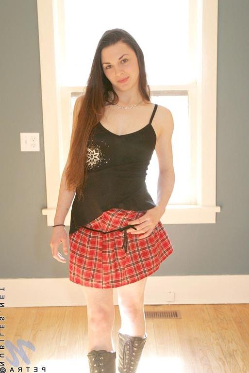 15P Alluring brunette chick petra gets horny and topless on camera