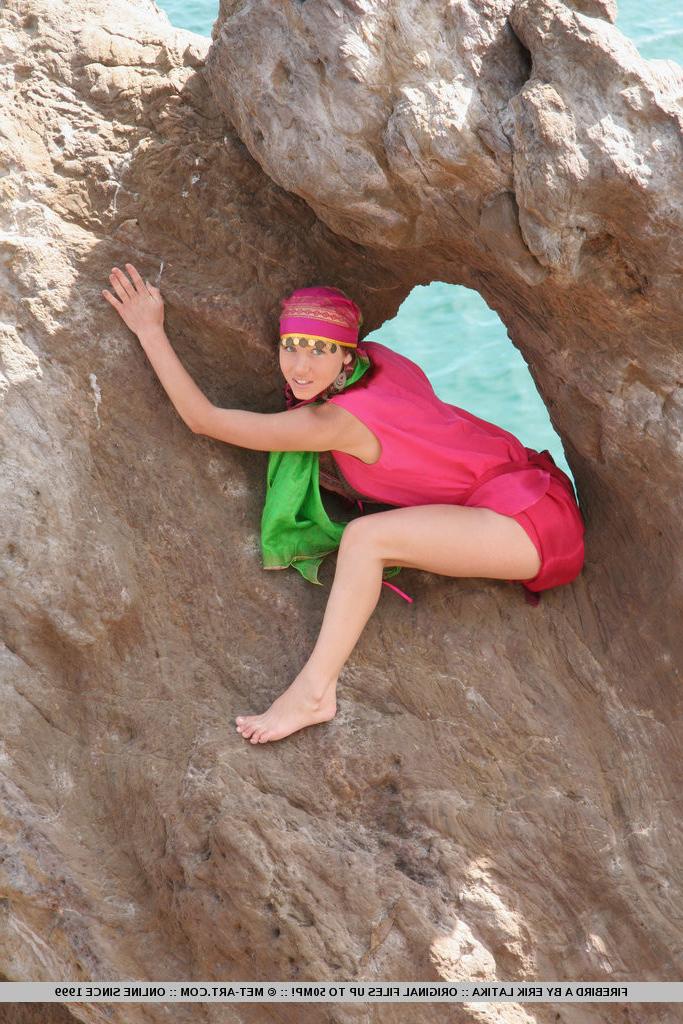 18P Wearing her sea gypsy costume, Firebird's alluring beauty stands