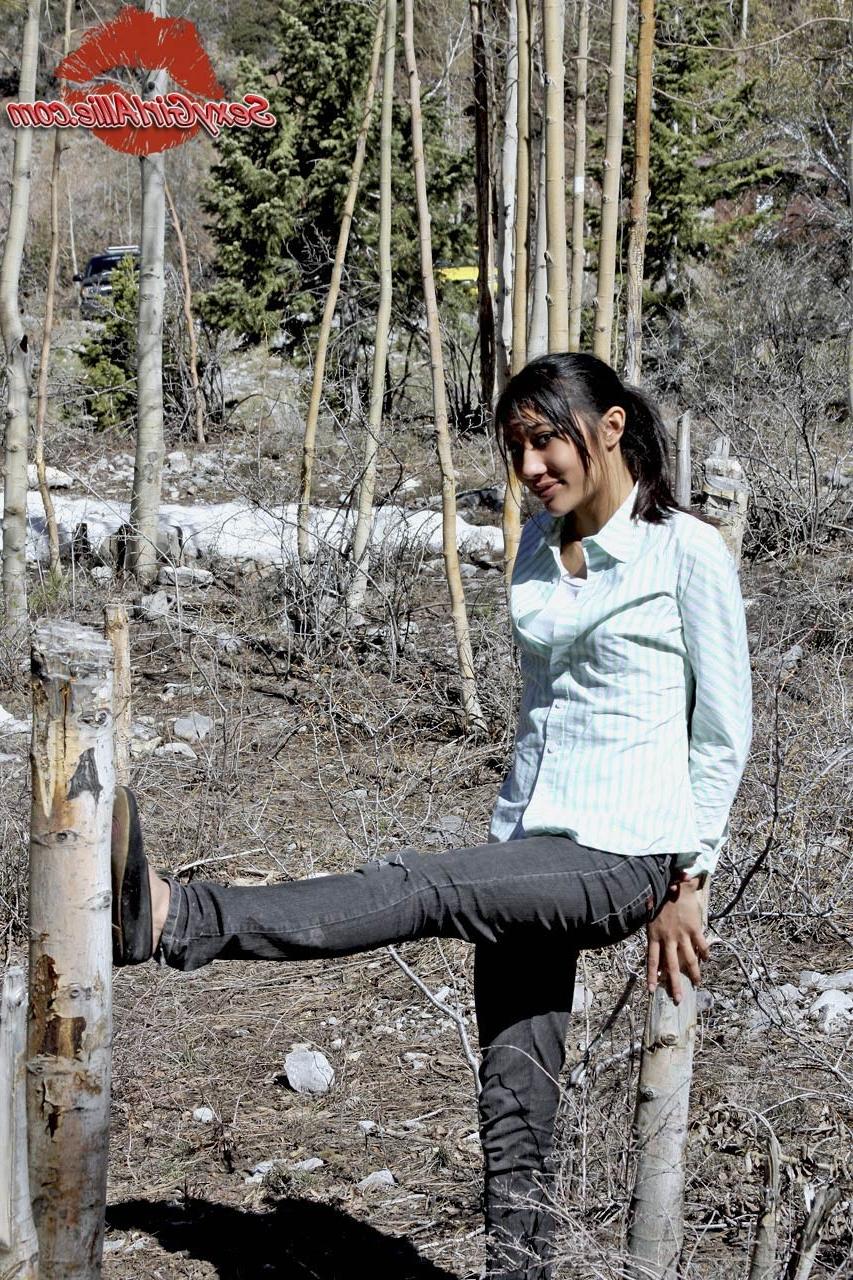 16P Skinny asian teen girl outdoors