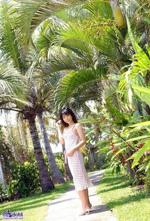 15P Japanese Saki Ninomiya poses outdoors showing body