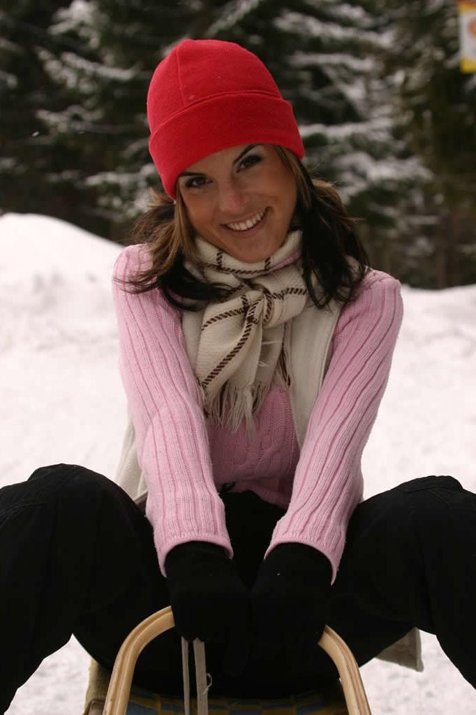 18P Horny brunette teen strips outdoors on a snow sled
