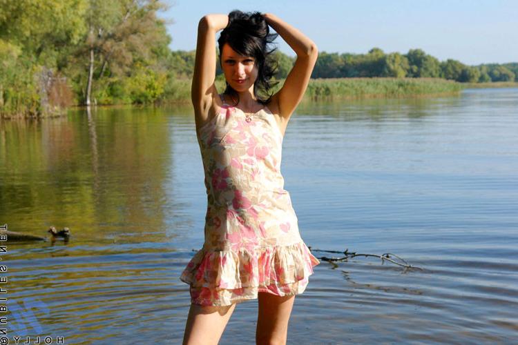15P Alluring holly stripping all her clothes till gets totally naked in the lake