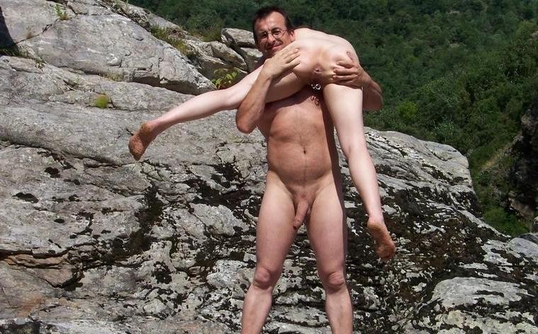 14P All eyes are on this big breasted nudist as she sunbathes